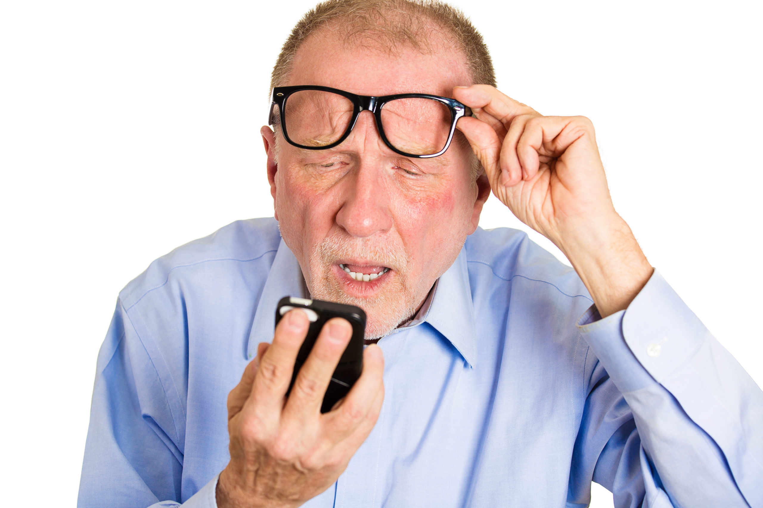 senior man squinting looking at phone
